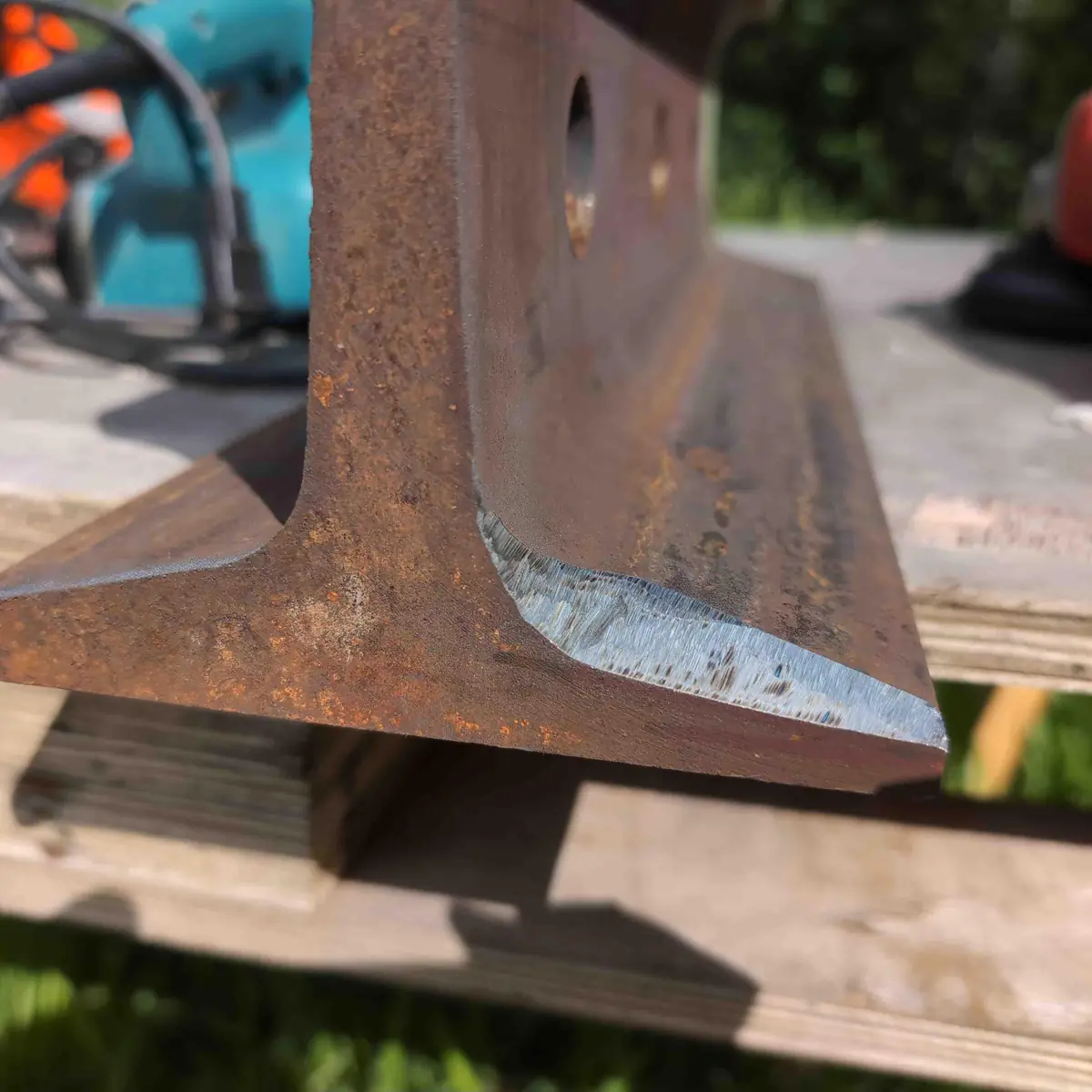 One bevel of a hot cut ground up to the center line